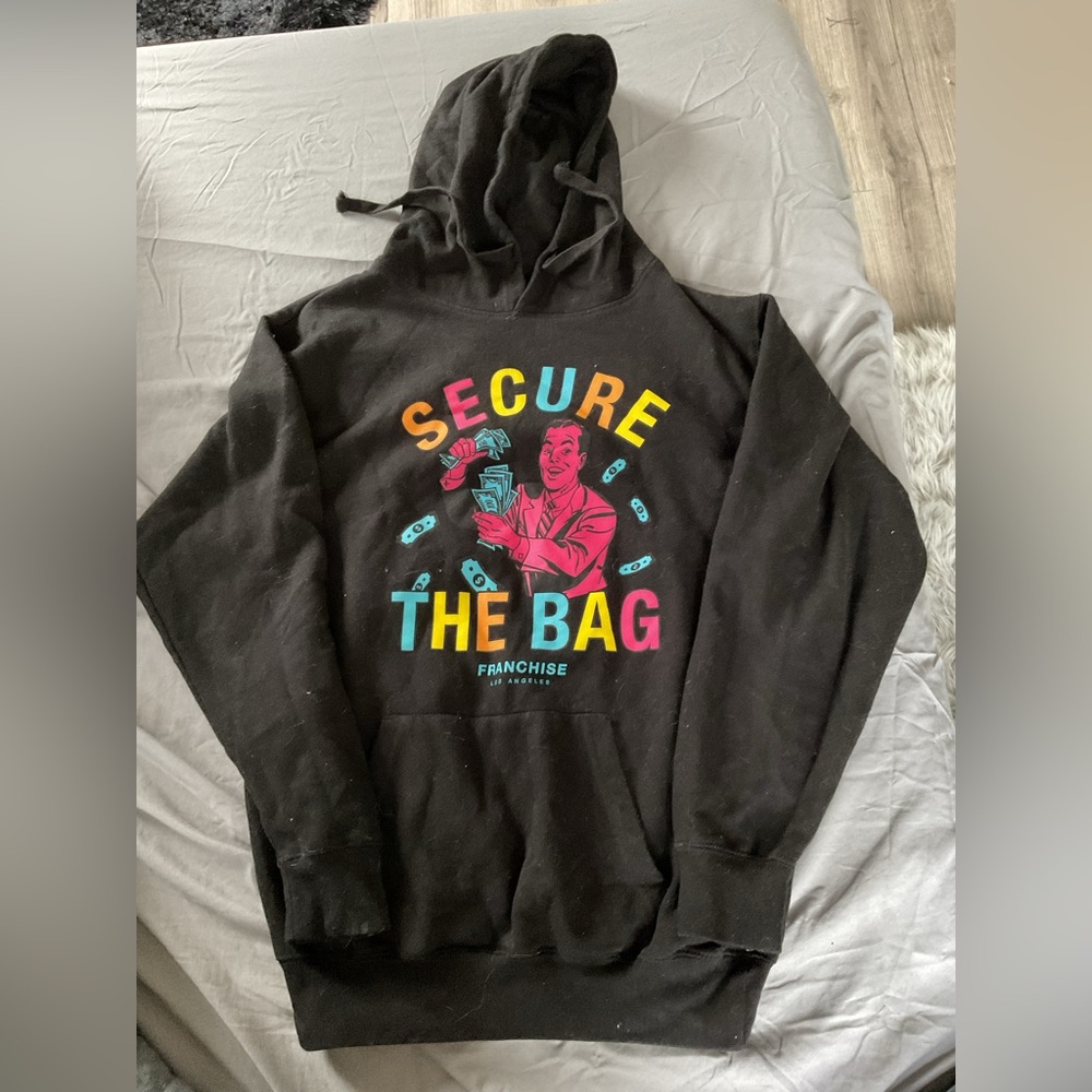 black hoodie secure the bag